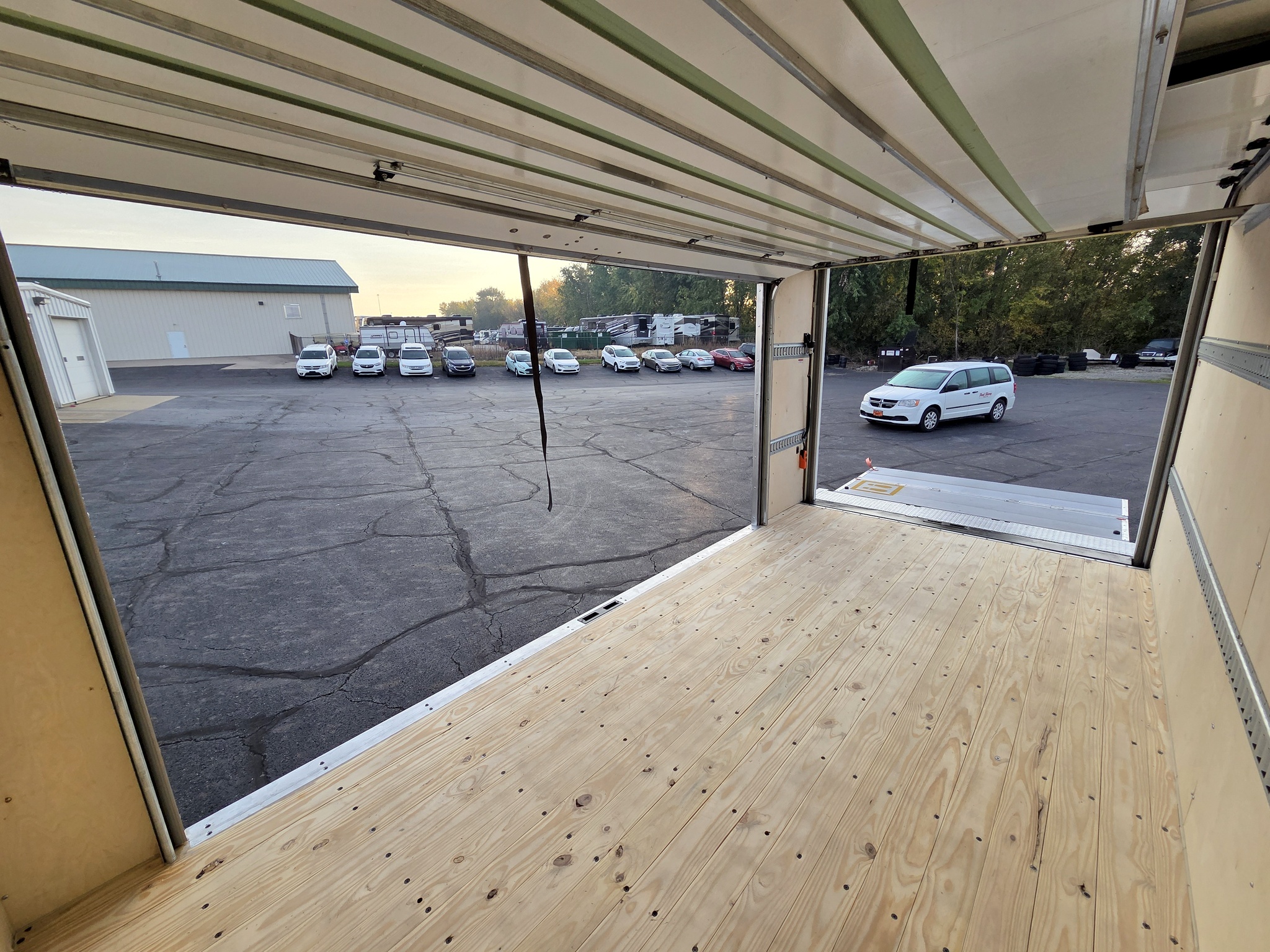 Interior of Bay Bridge box truck body with pine shiplap floor, E-track rails and translucent roof