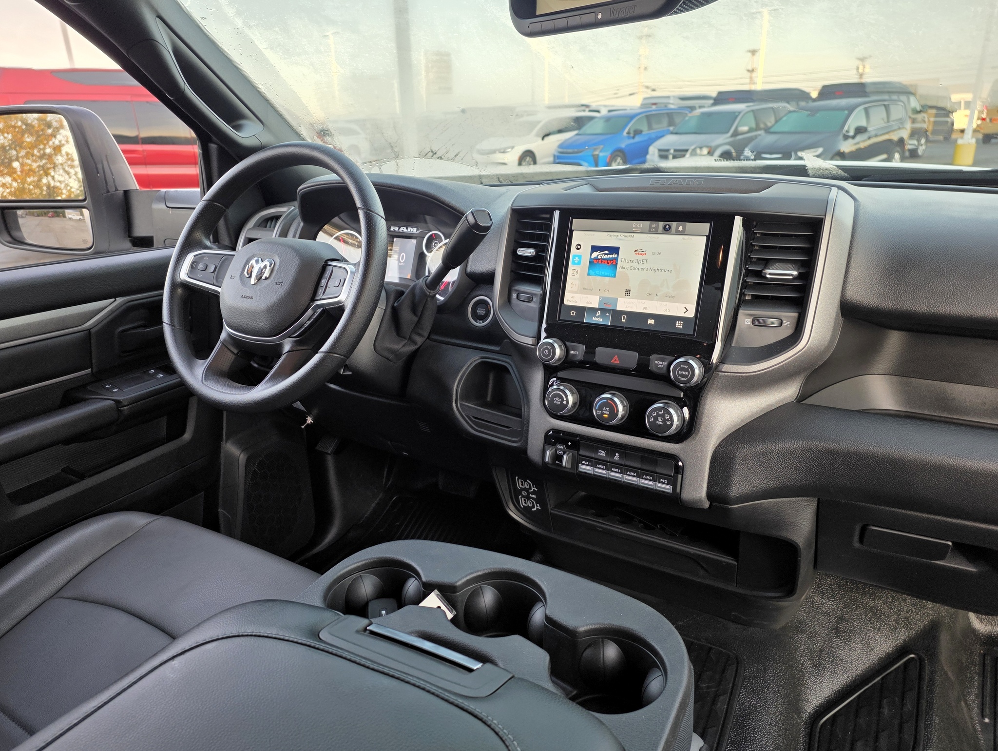 Interior of a 2026 Ram 5500 regular cab pickup truck with a touchscreen radio display