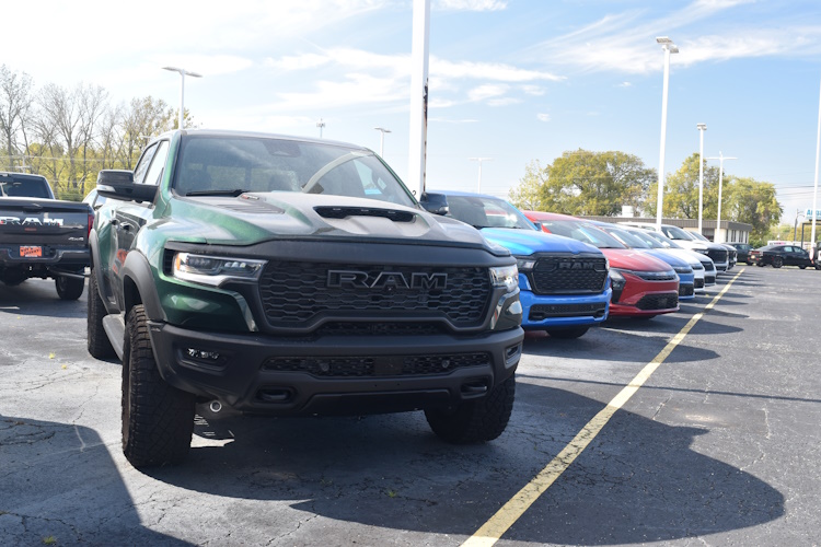 New RAM trucks lined up at Paul Sherry Chrysler Dodge Jeep RAM dealership in Piqua, Ohio